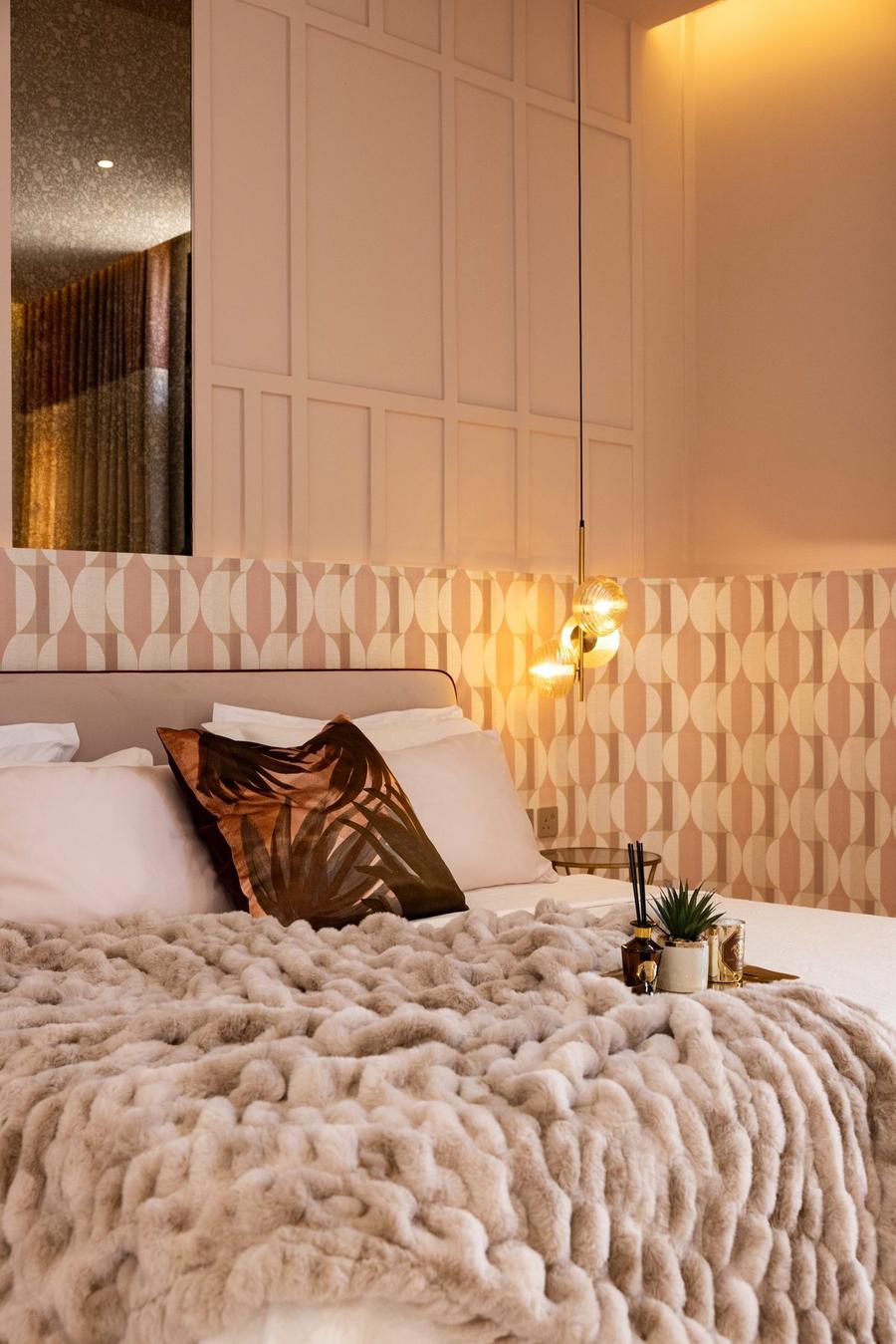 Bedroom headboard and wallpaper detail