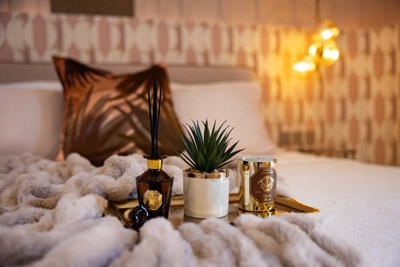 Bedside styling with scent diffuser and candle